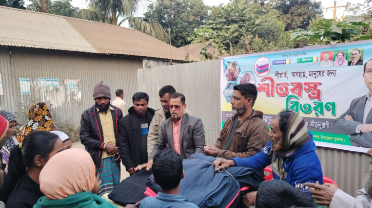 মুছাপুরে মাসুদুজ্জামানের পক্ষে শীতবস্ত্র বিতরন