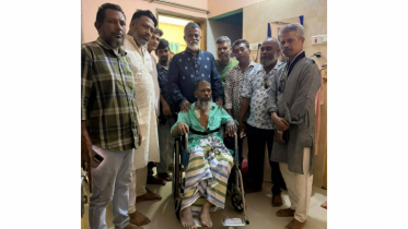 অসুস্থ শ্রমিকদল নেতাকে হুইল চেয়ার উপহার দিলেন খোরশেদ